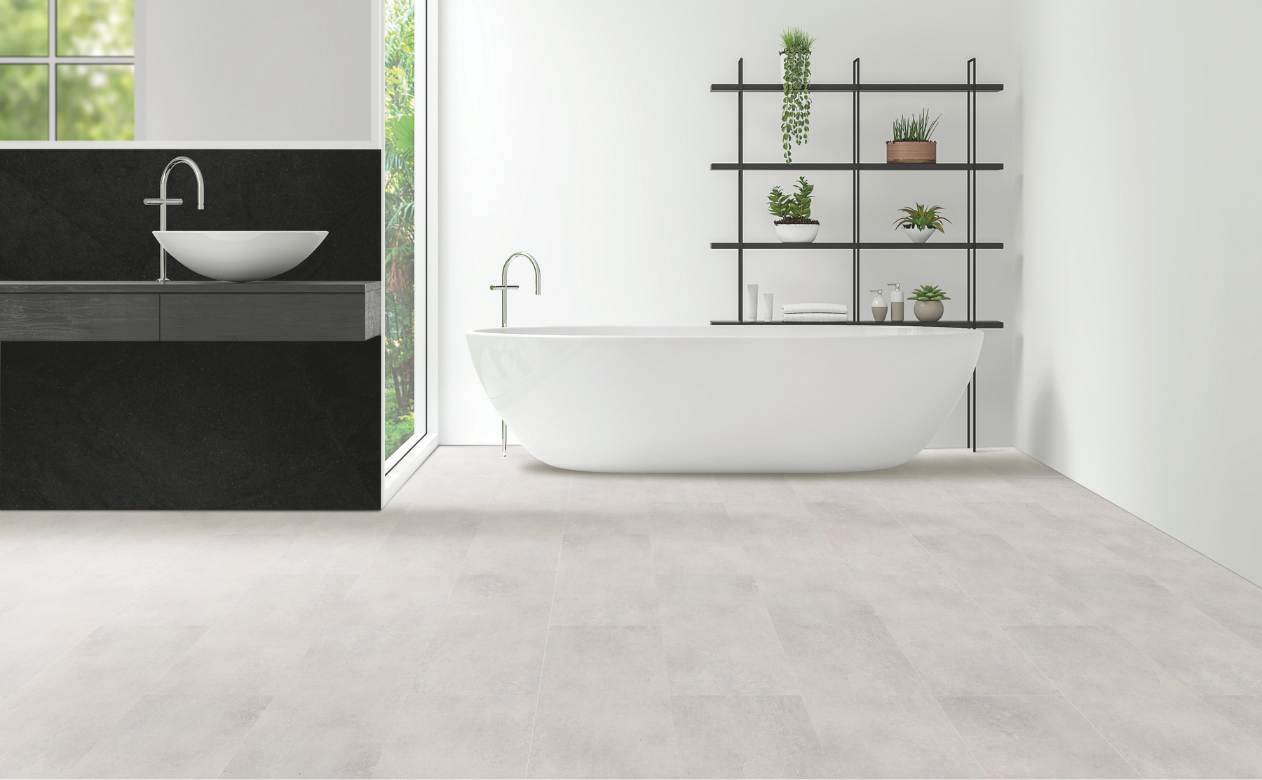 bathroom with gray tile flooring